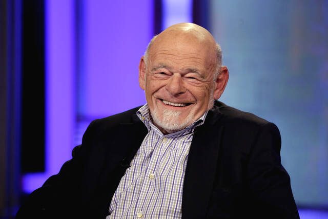 Sam Zell, chairman of Equity Group Investments, and chairman of Equity International, smiles during an interview by Neil Cavuto, on the Fox Business Network, in New York, on Aug. 6, 2013. Zell, a Chicago real estate magnate who earned a multibillion-dollar fortune and a reputation as “the grave dancer” for his ability to revive moribund properties, died on Thursday, May 18, 2023. He was 81.