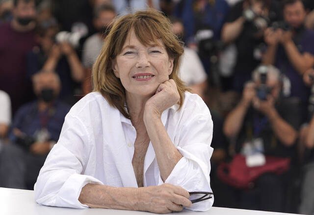 Jane Birkin poses for photographers at the photo call for the film ‘Jane By Charlotte’ at the 74th international film festival, Cannes, southern France.