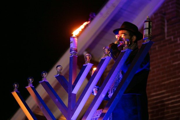 Dec. 7, 2023: Rabbi Sholly Cohen, of the Chabad Jewish Center of Carroll County, sings as the first candle of Chanukah is lit.The annual Chanukah Menorah lighting on Main Street in Mt. Airy, co-hosted by the Chabad Jewish Center of Carroll County. (Nate Pesce/ for Carroll County Times)