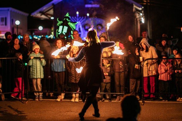Dec. 7, 2023: Fire dancers from Luciole Liberation, LLC put on a show after the menorah lighting.The annual Chanukah Menorah lighting on Main Street in Mt. Airy, co-hosted by the Chabad Jewish Center of Carroll County. (Nate Pesce/ for Carroll County Times)