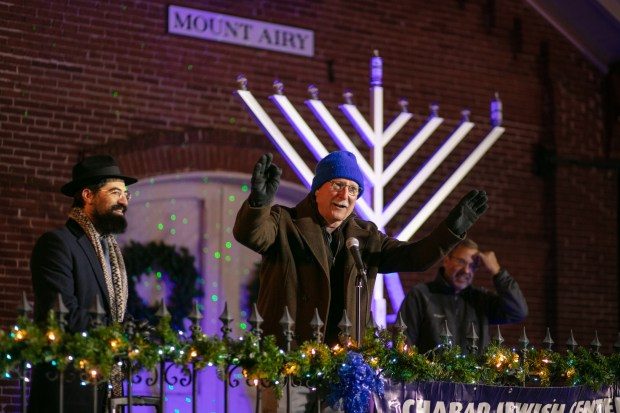 Dec. 7, 2023: Mt. Airy Mayor Larry Hushour speaks at the menorah lighting event.The annual Chanukah Menorah lighting on Main Street in Mt. Airy, co-hosted by the Chabad Jewish Center of Carroll County. (Nate Pesce/ for Carroll County Times)