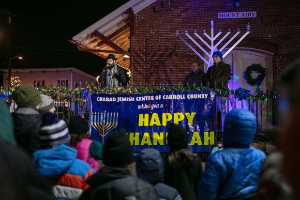 Dec. 7, 2023: Rabbi Sholly Cohen, of the Chabad Jewish Center of Carroll County, leads the menorah lighting.The annual Chanukah Menorah lighting on Main Street in Mt. Airy, co-hosted by the Chabad Jewish Center of Carroll County. (Nate Pesce/ for Carroll County Times)