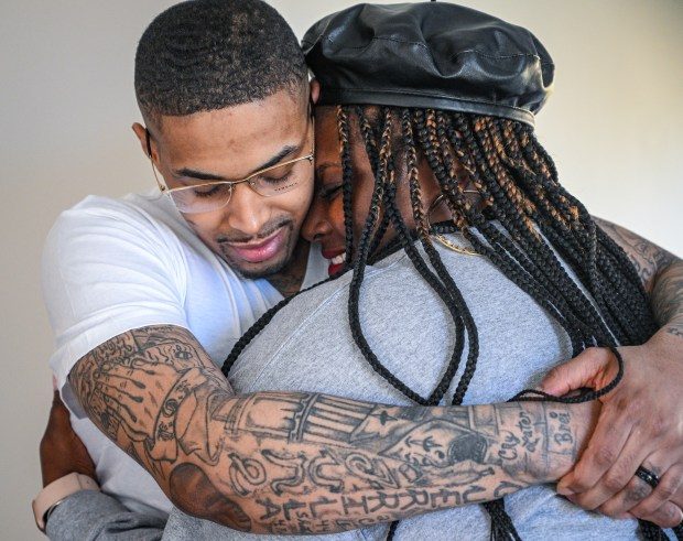 Keith Davis Jr. hugs his wife Kelly during a celebration of his release from custody after newly elected Baltimore State's Attorney Ivan Bates dropped all charges against Davis. Davis, 31, had spent the past seven years locked behind bars on murder charges in the shooting of Pimlico Race Course security guard Kevin Jones. He has always maintained his innocence.