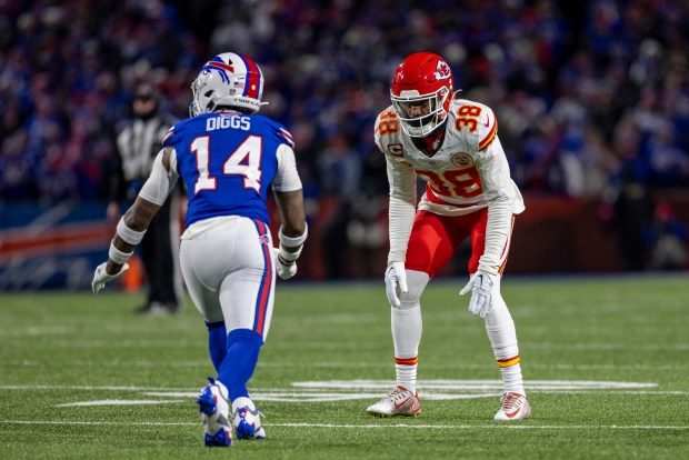 Kansas City Chiefs cornerback L'Jarius Sneed (38) defends against Buffalo Bills wide receiver Stefon Diggs (14) during an NFL divisional round playoff football game, Sunday, Jan. 21, 2024 in Orchard Park, NY. (AP Photo/Matt Durisko)