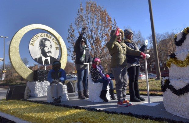 A float displays a photo of Dr. Martin Luther King, Jr. during Baltimore's MLK Day Parade honoring the slain civil rights leader.