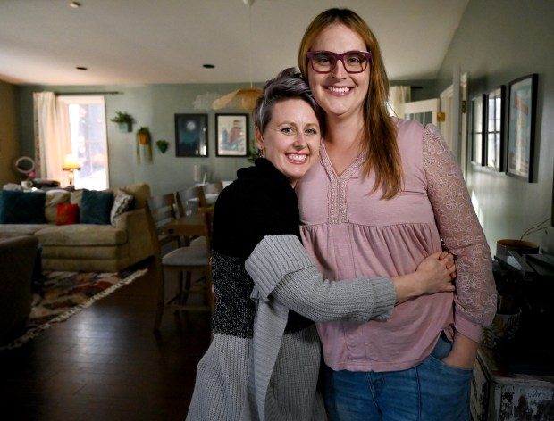 From left, Katie and Nia Chiaramonte are part of the Hulu documentary xe2x80x9cWe Live Here: The Midwest,xe2x80x9d that follows midwestern LGBTQ families. They were filmed in March 2022 when they lived in Indianola, IA. The Chiaramontes now live in Baltimore County. (Kim Hairston/Staff photo)