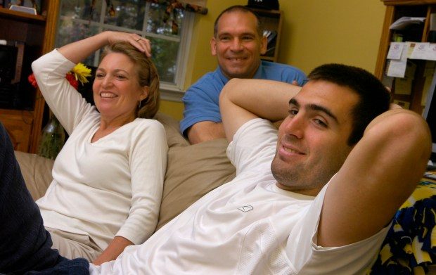 AUDUBON, NEW JERSEY--APRIL 29, 2008-- Joe Flacco (R) is the Baltimore Ravens 1st draft pick in the 2008 NFL draft. He is pictured with his mother, Karen and father, Steve at his family home in Audubon, NJ. Baltimore Sun staff photo by LLOYD FOX