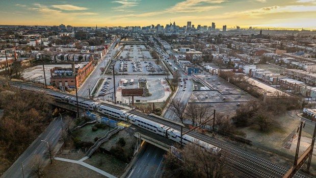 xc2xa0A southbound MARC train stops at the West Baltimore MARC Station above Franklin Street and Mulberry Street near the end of the highway to nowhere.xc2xa0(Jerry Jackson/Staff photo)