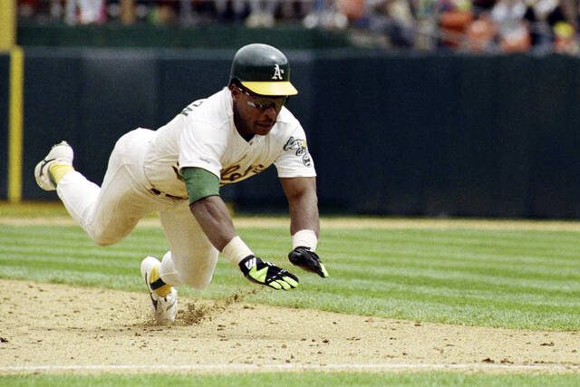 Stolen base king Rickey Henderson dies at 65